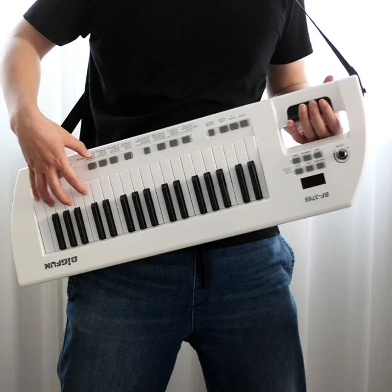 Rechargeable 37-Key Mini Keyboard Piano with Carry Strap