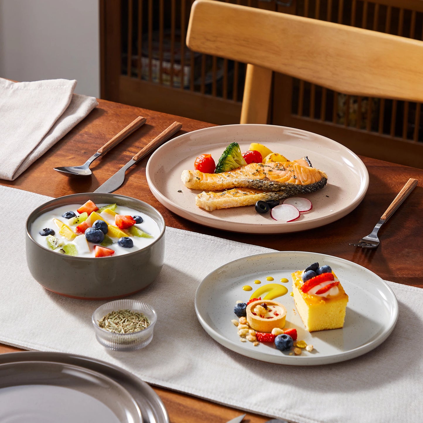 White 12 Piece Stoneware Dinnerware Set with Curved Edge Design