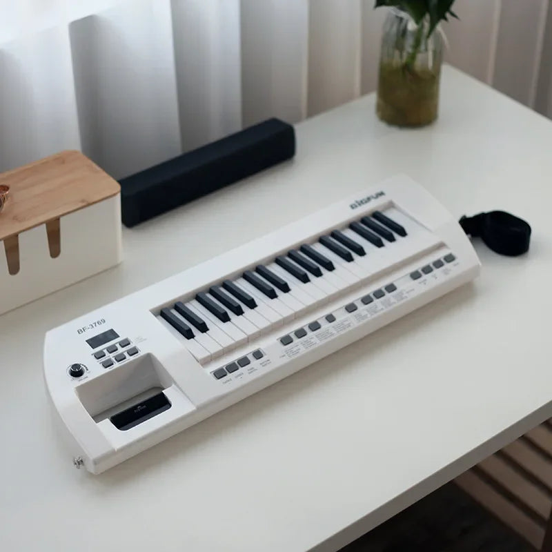 Rechargeable 37-Key Mini Keyboard Piano with Carry Strap