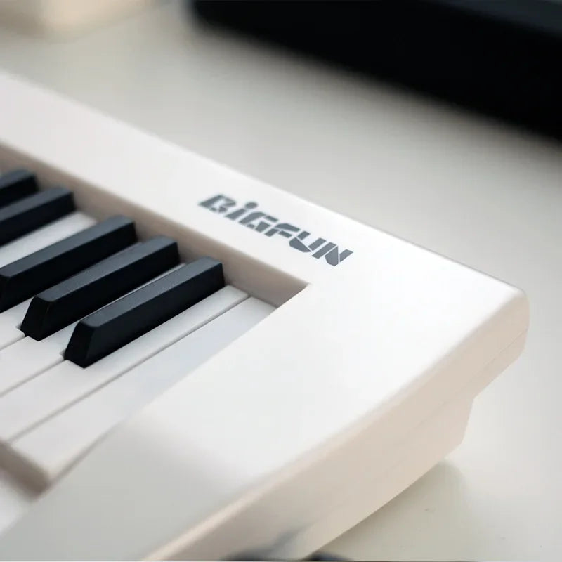 Rechargeable 37-Key Mini Keyboard Piano with Carry Strap