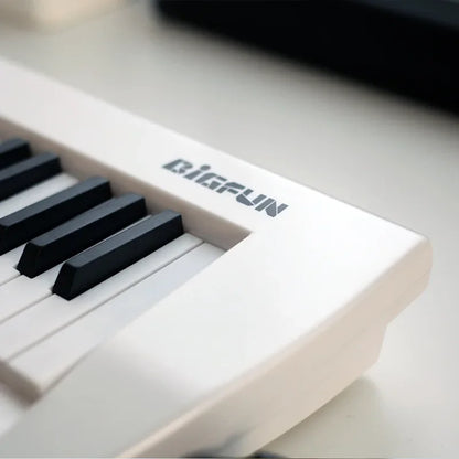 Rechargeable 37-Key Mini Keyboard Piano with Carry Strap